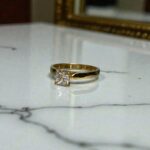 Anillo solitario corte Princesa Oro 18k