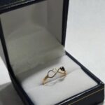 Anillo Juvenil Infinito Oníx Oro 18k